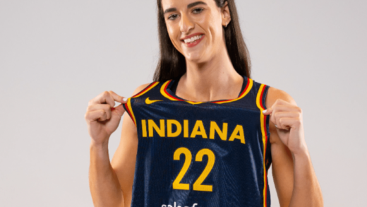 Caitlin clark holding jersey closeup wallpaper