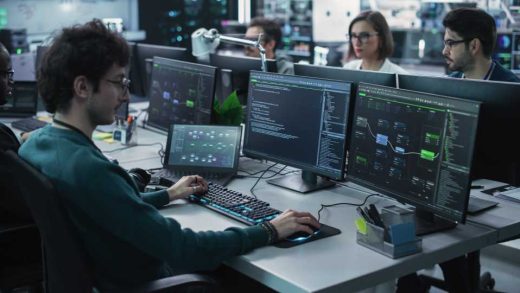Team of Diverse Multiethnic Software Developers Working on Computers, Programming Advanced Code, Managing Artificial Intelligence Projects Online for Innovative Cybersecurity Technology Company