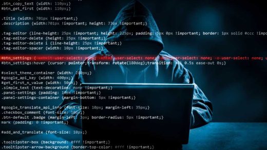 Hacker using laptop. Lots of digits on the computer screen.