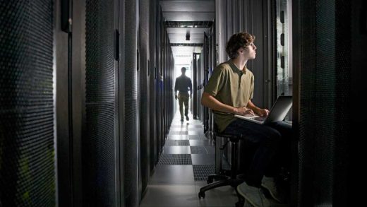 man monitoring network security