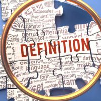 Definition as a complex and multipart topic under close inspection. Complexity shown as matching puzzle pieces defining dozens of vital ideas and concepts about Definition,3d illustration