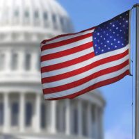 US flag in front of government state capital