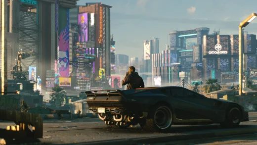 V sits on the hood of a black sports car looking out over the Night City skyline, with neon billboards and tall towers in the distance