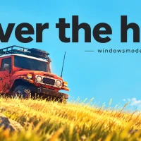 A muddy rust-orange 4x4 with a roof rack sits on a hill of golden grass under a bright blue sky with white clouds, below the over the hill title and windowsmode.com
