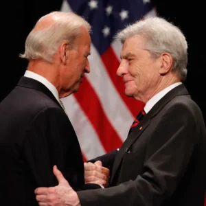 Joe biden greeting colleague