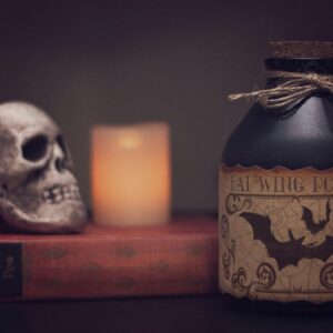 Bat wing potion skull candle