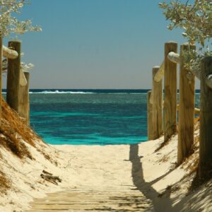 Beach pathway to turquoise ocean