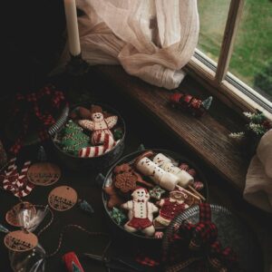 Christmas decorations and treats on table