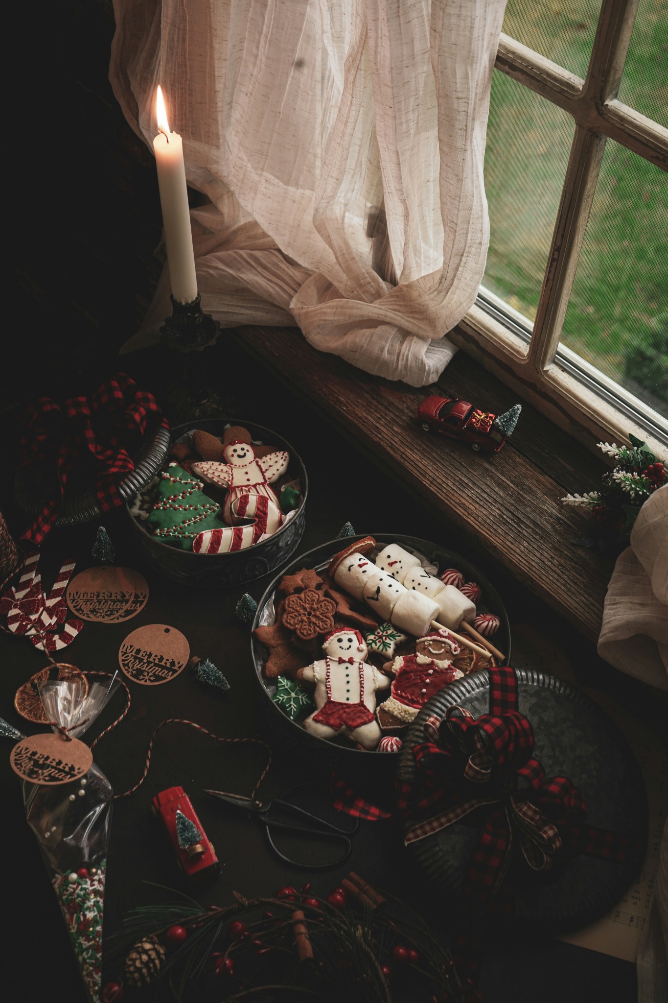 Christmas decorations and treats on table