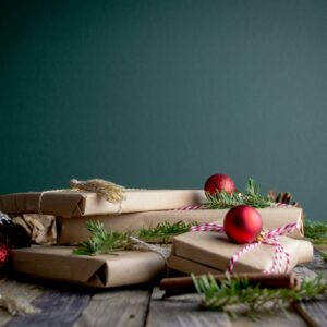 Christmas gifts wrapped in brown paper