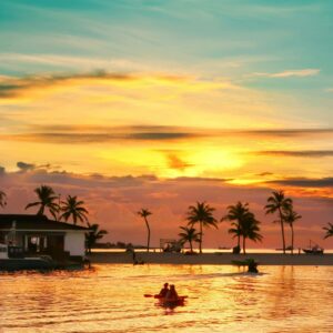 Kayaking at sunset tropical