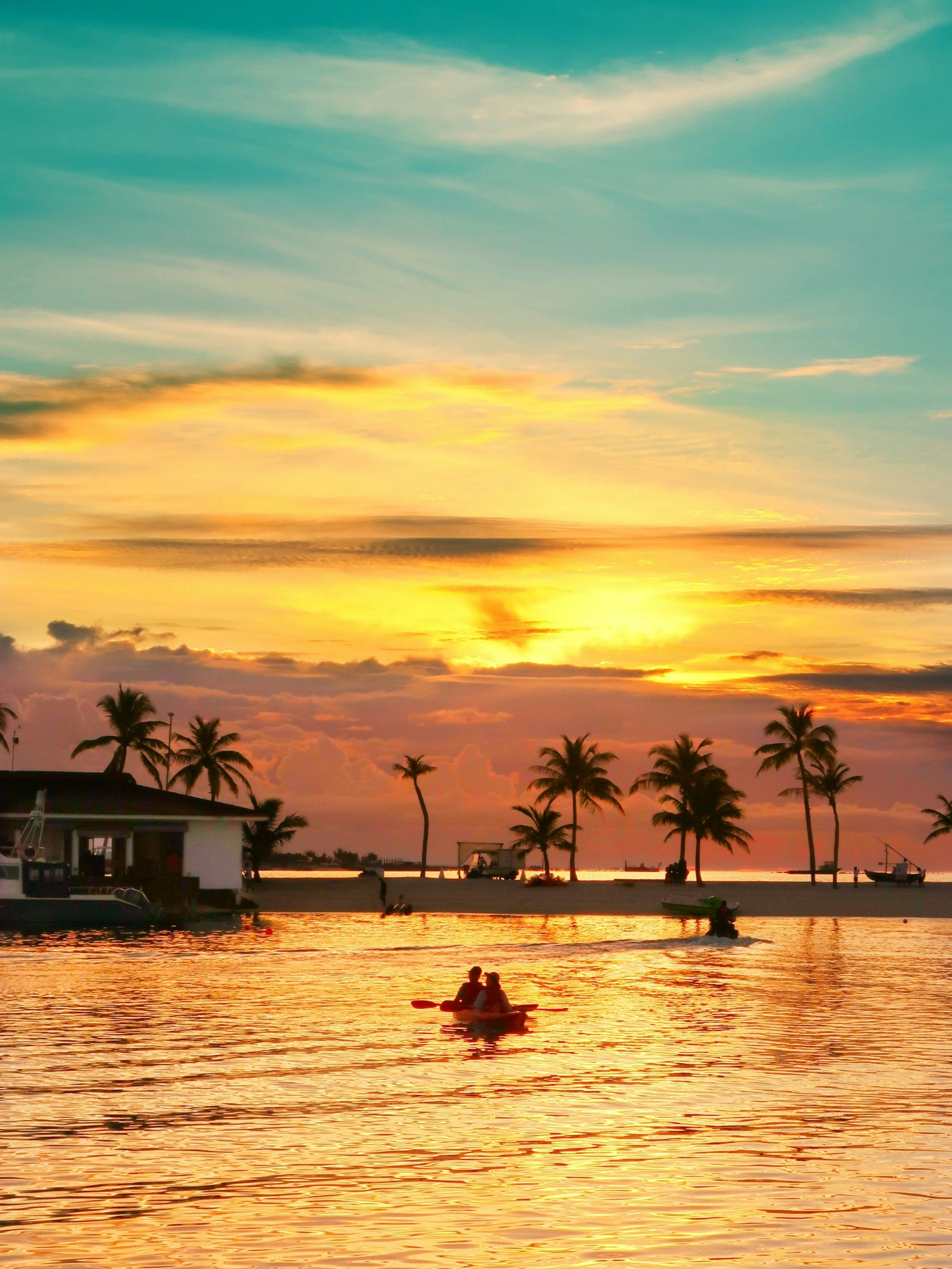 Kayaking at sunset tropical