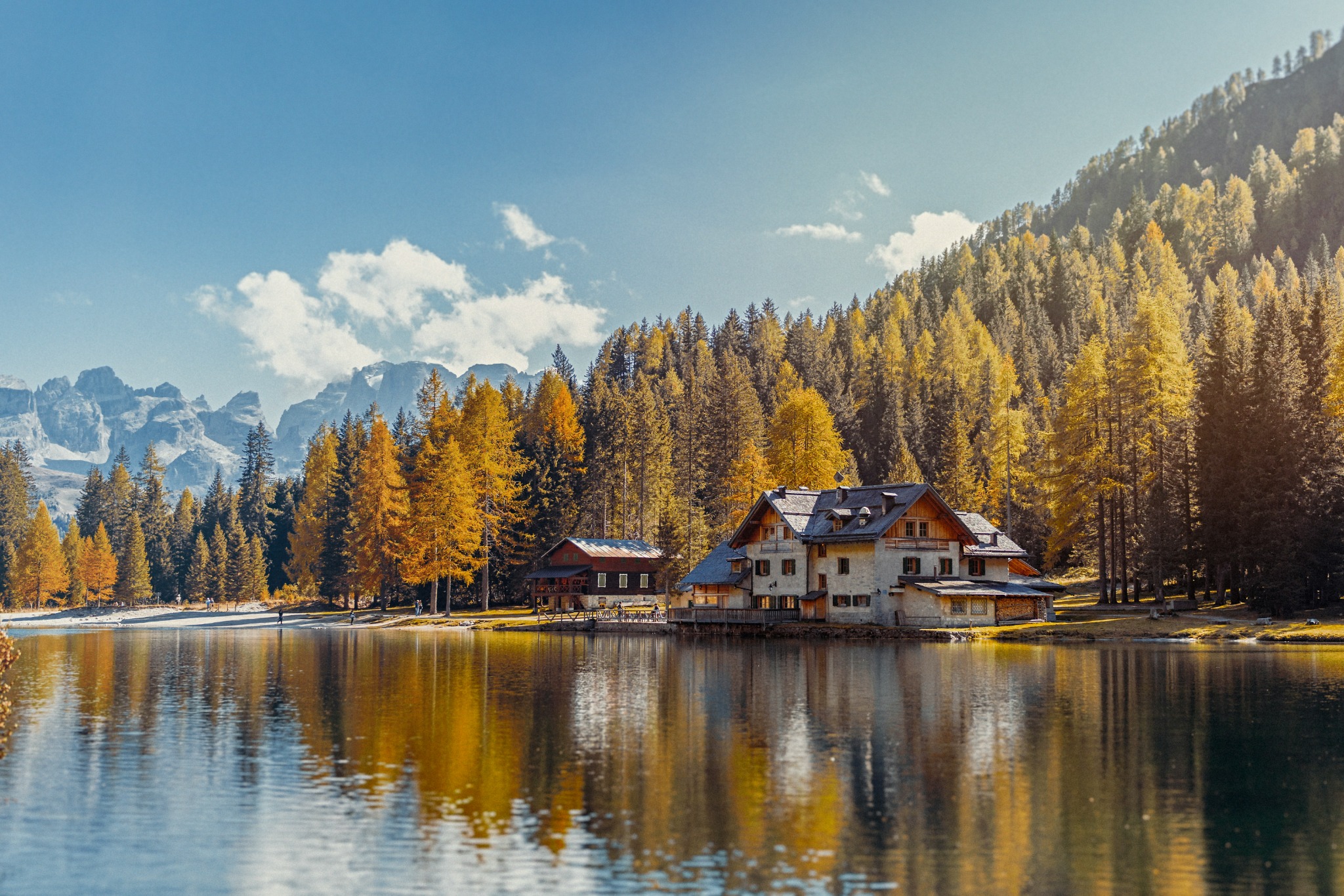 Lakeside house autumn forest mountains