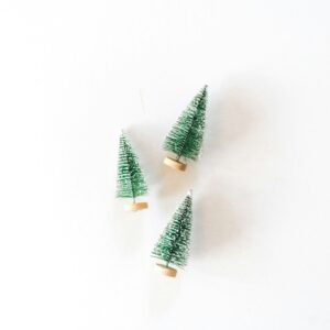 Mini christmas trees on white background