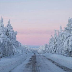 Snowy road pink sky