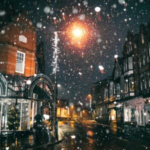 Snowy town night lights