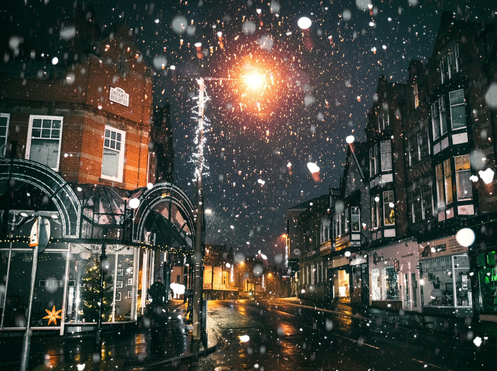 Snowy town night lights