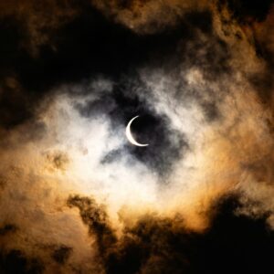 Solar eclipse dark clouds