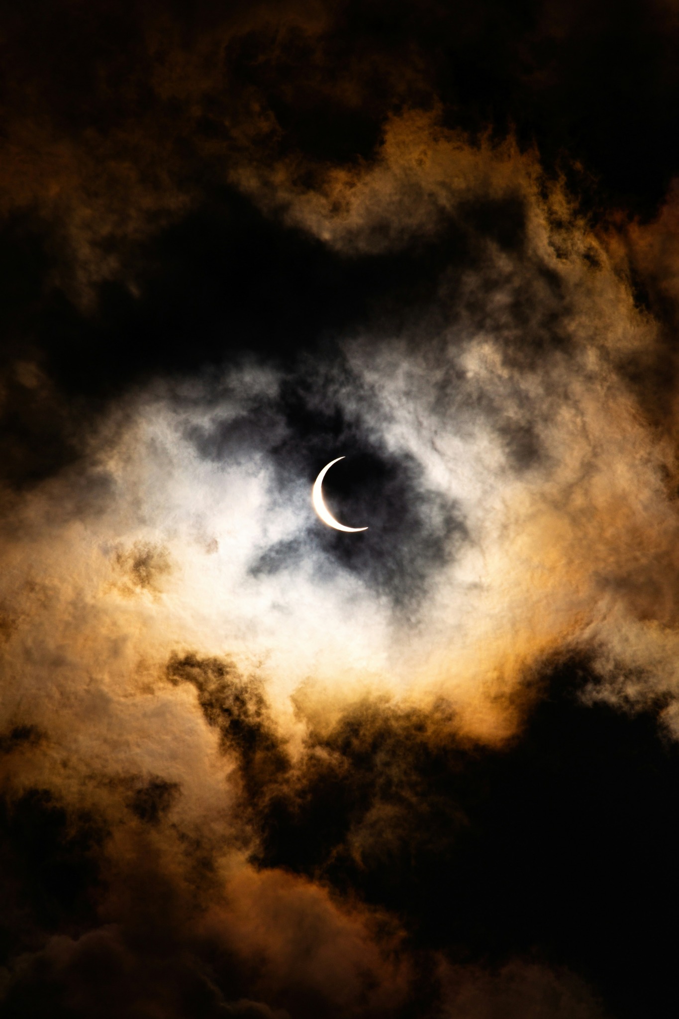 Solar eclipse dark clouds