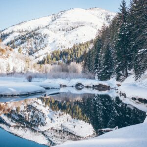 Tranquil winter river snow reflection