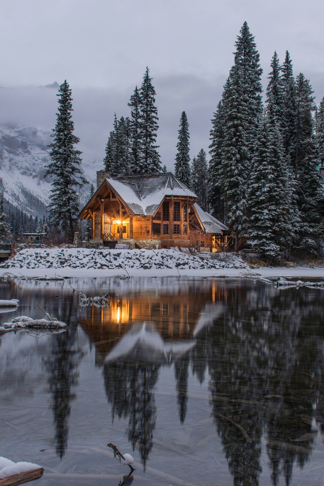 Twilight cabin reflection winter lake