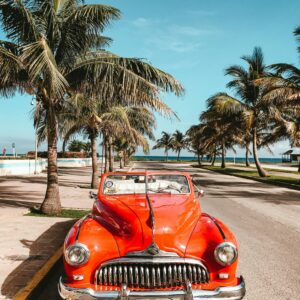Vintage red car tropical