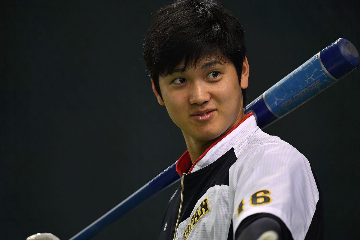 Shohei ohtani with bat over shoulder