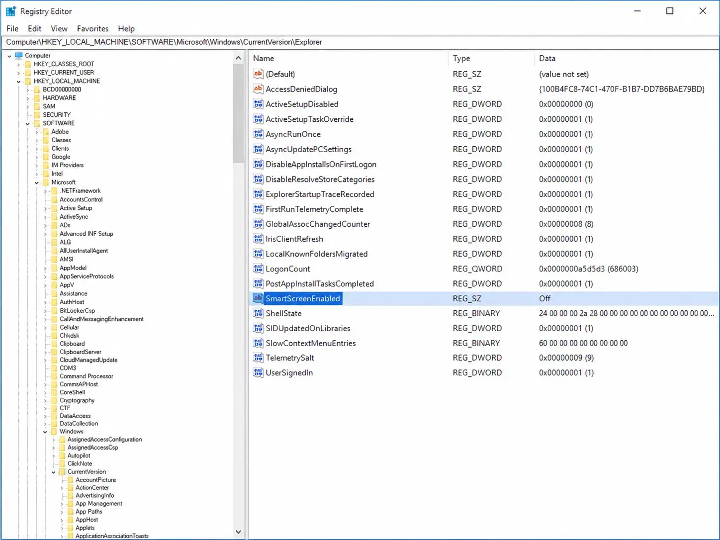Windows Registry Editor showing the SmartScreenEnabled key set to Off
