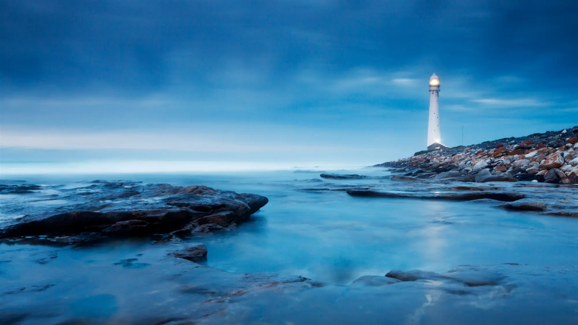 Lighthouses by Night wallpaper preview on a Windows desktop