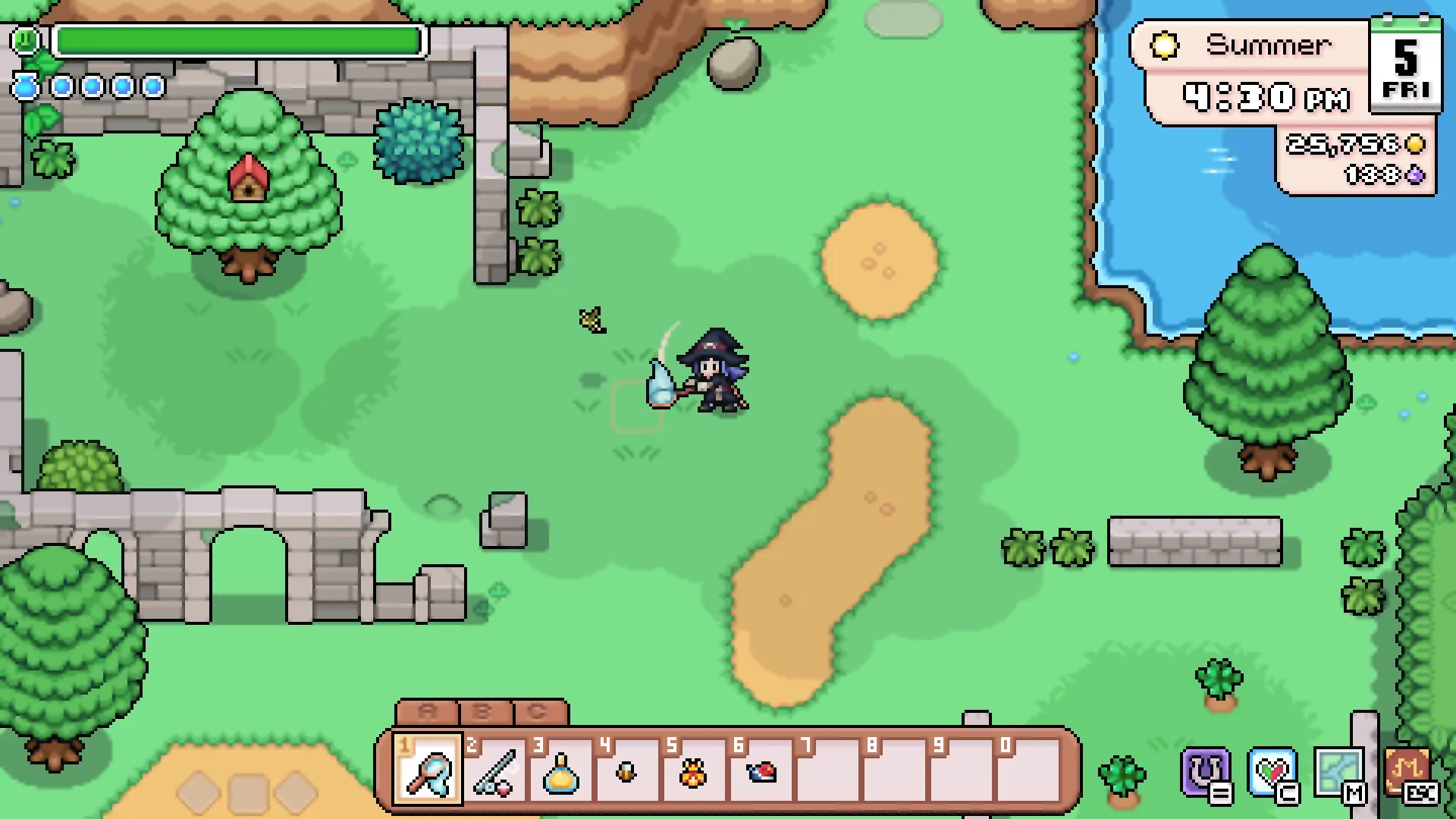 The farmer, in a witch hat, catches bugs with a net on a summer hillside beside crumbling stone ruins in Fields of Mistria