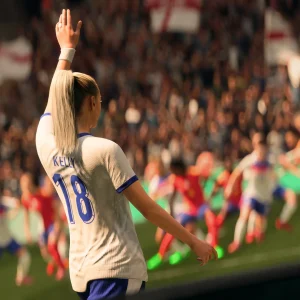 An England player wearing number 18 raises her hand before taking a corner kick in front of a packed stadium