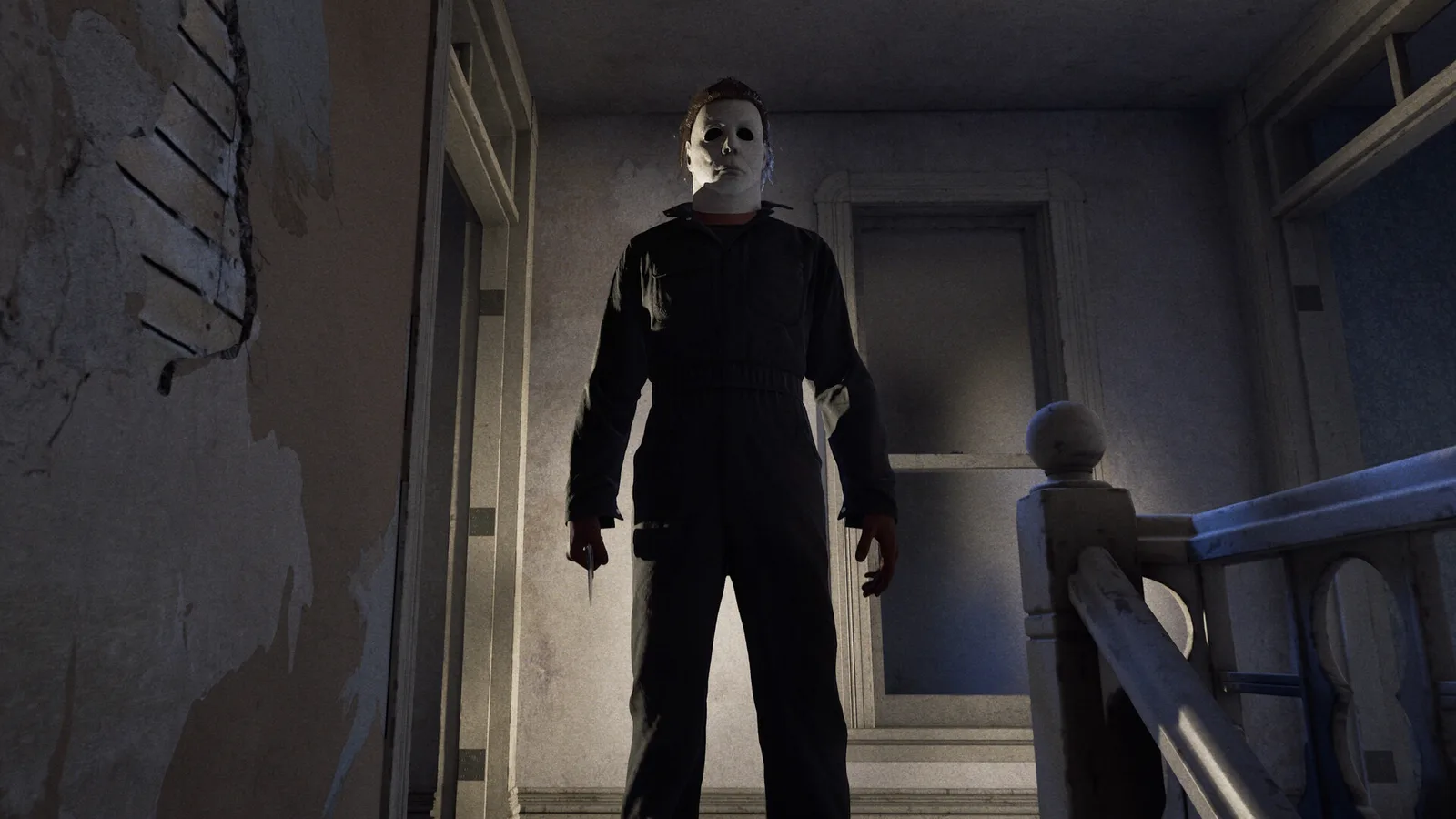 Michael Myers standing on a pale upstairs landing holding a knife down at his side