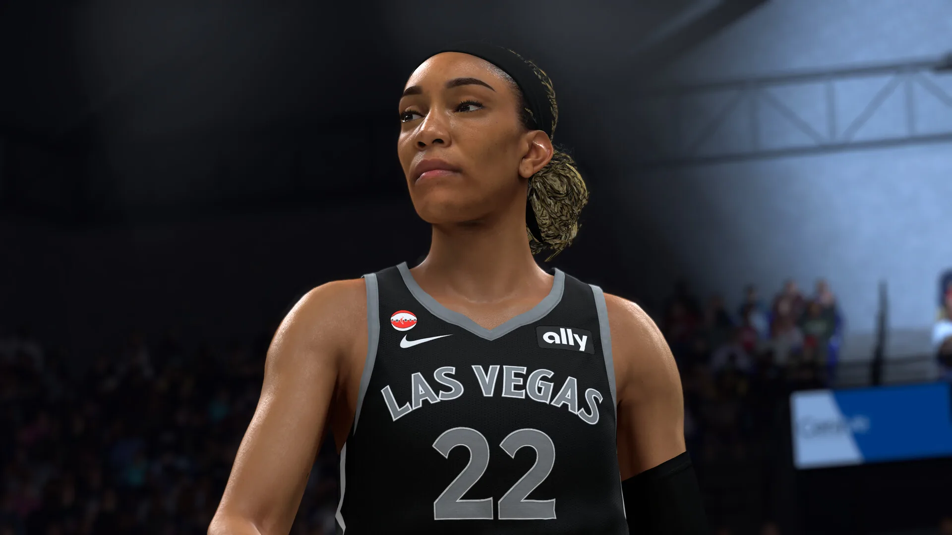 A'ja Wilson in a black Las Vegas Aces number 22 jersey on court in the The W mode of NBA 2K27