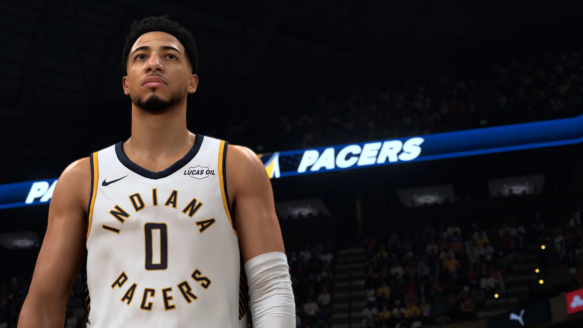 Tyrese Haliburton in a white Indiana Pacers number 0 jersey inside a packed arena in NBA 2K27