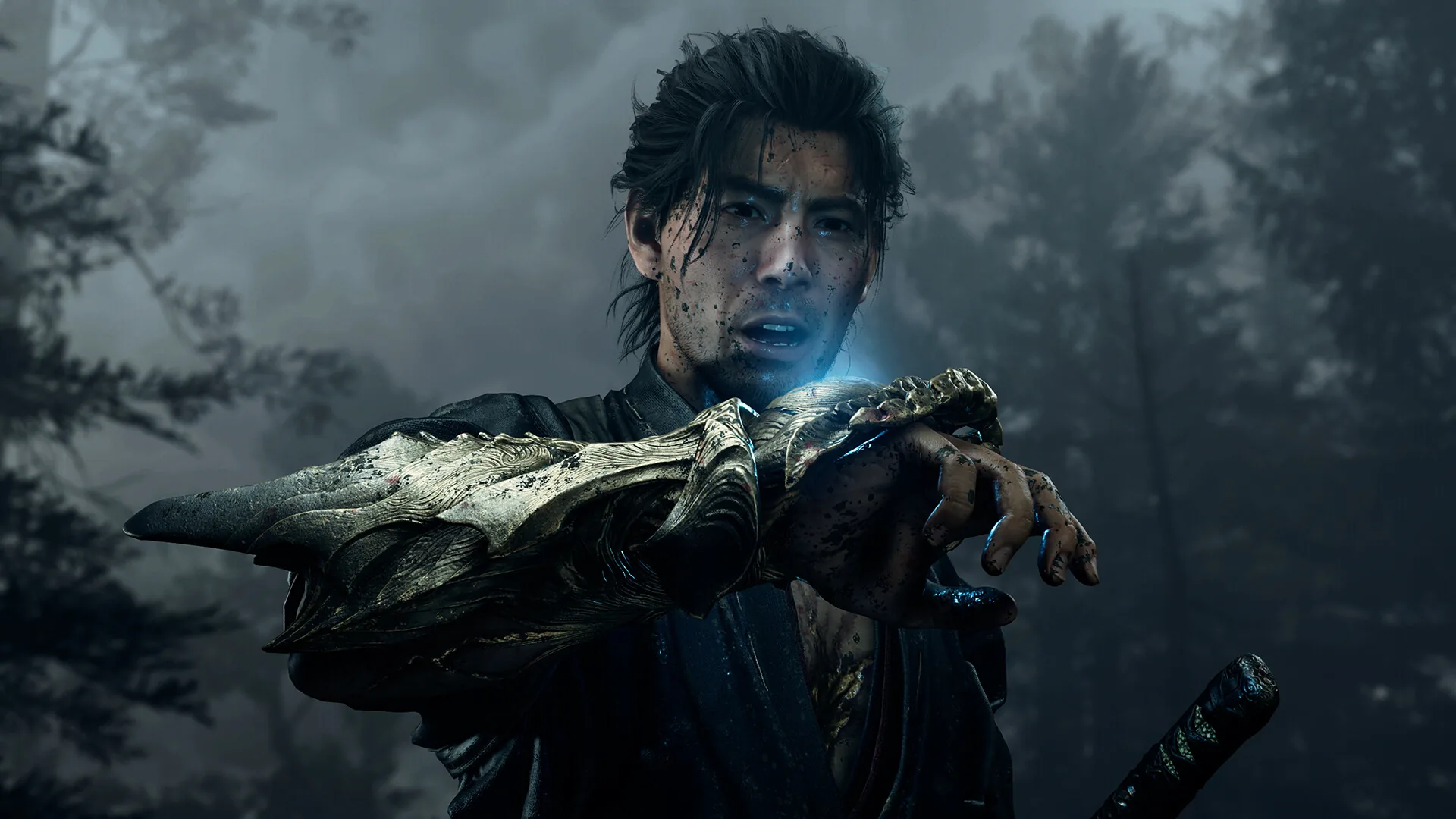 Close up of Miyamoto Musashi holding up the bone-like Oni Gauntlet on his left arm in misty woodland