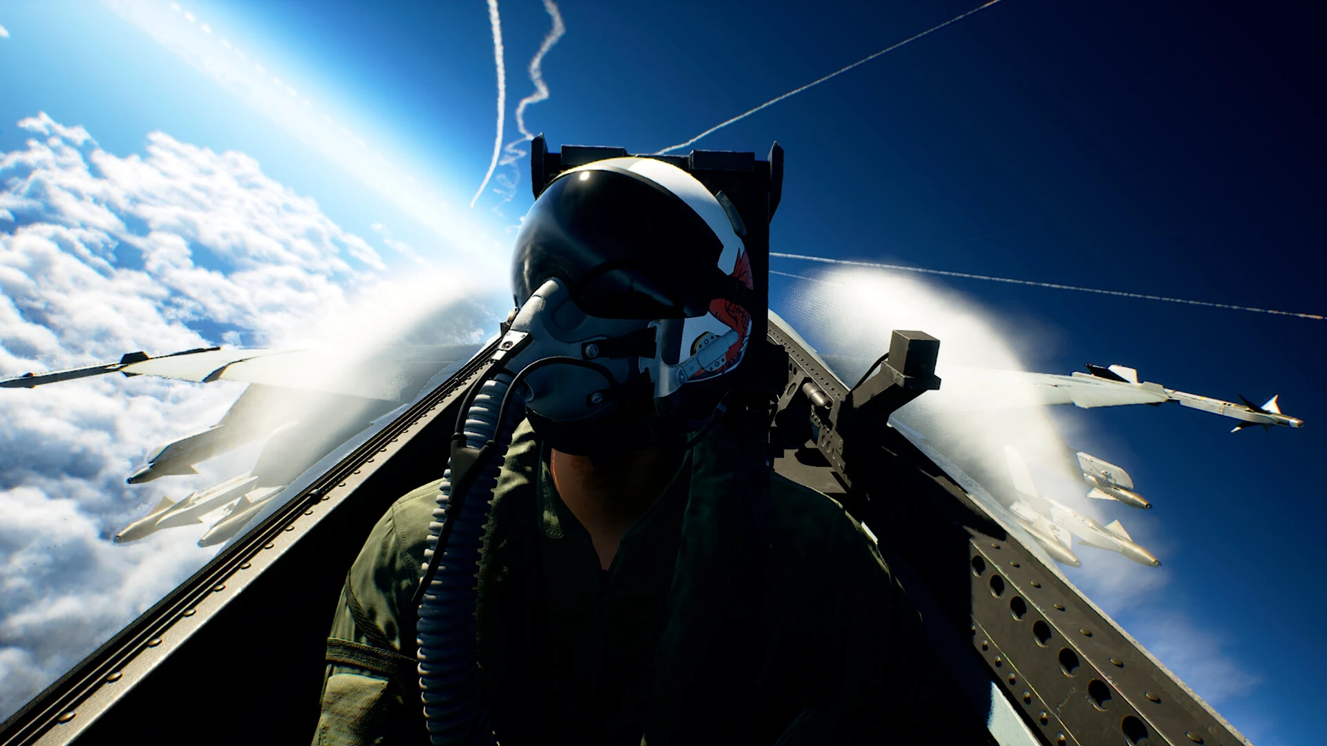 A pilot in a flight helmet and oxygen mask looks back from the cockpit of a fighter jet high above the clouds, with wingmen trailing vapor behind