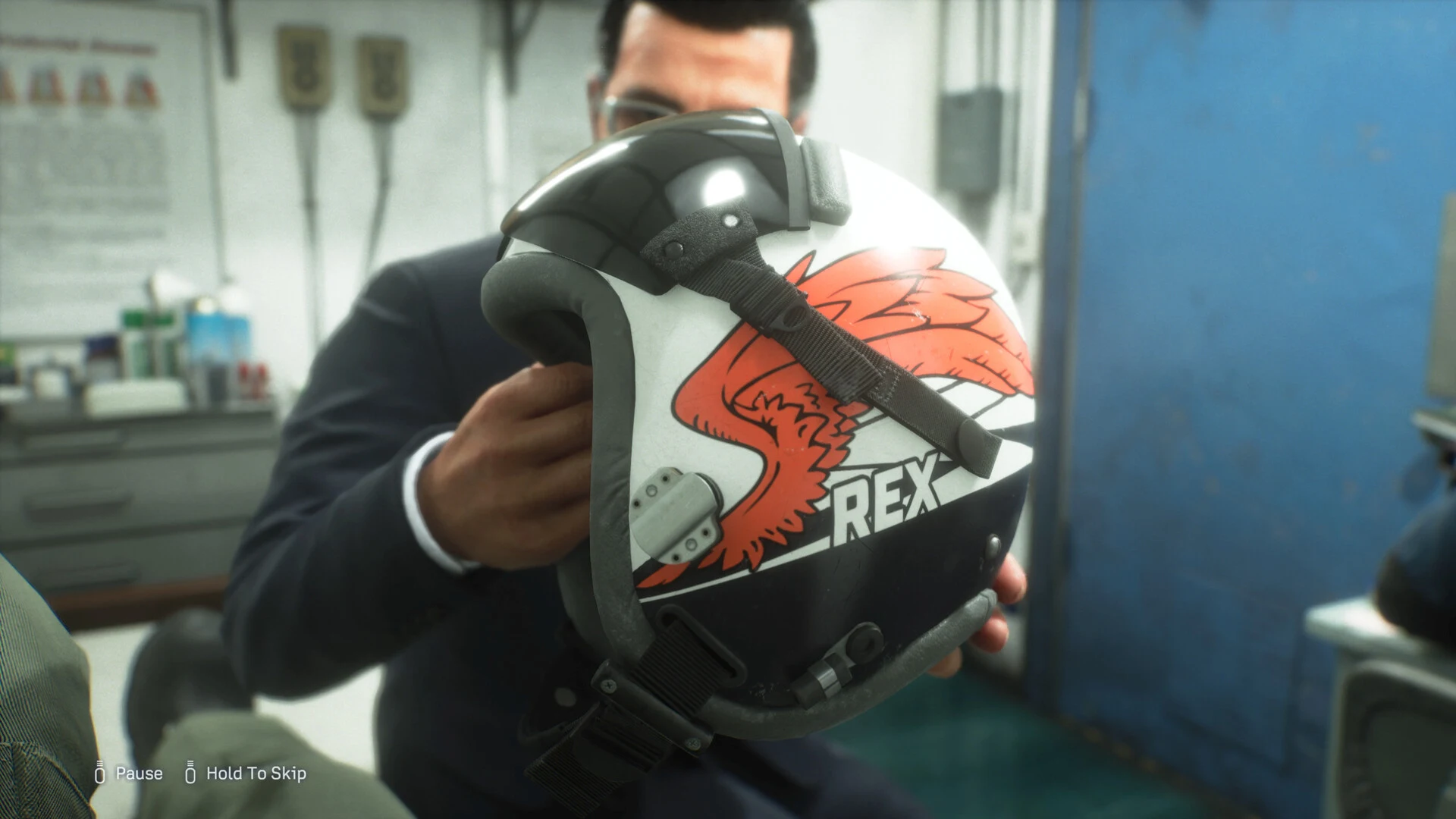 A pilot holds a white flight helmet painted with a red bird and the call sign REX in a cutscene from the Ace Combat 8 campaign