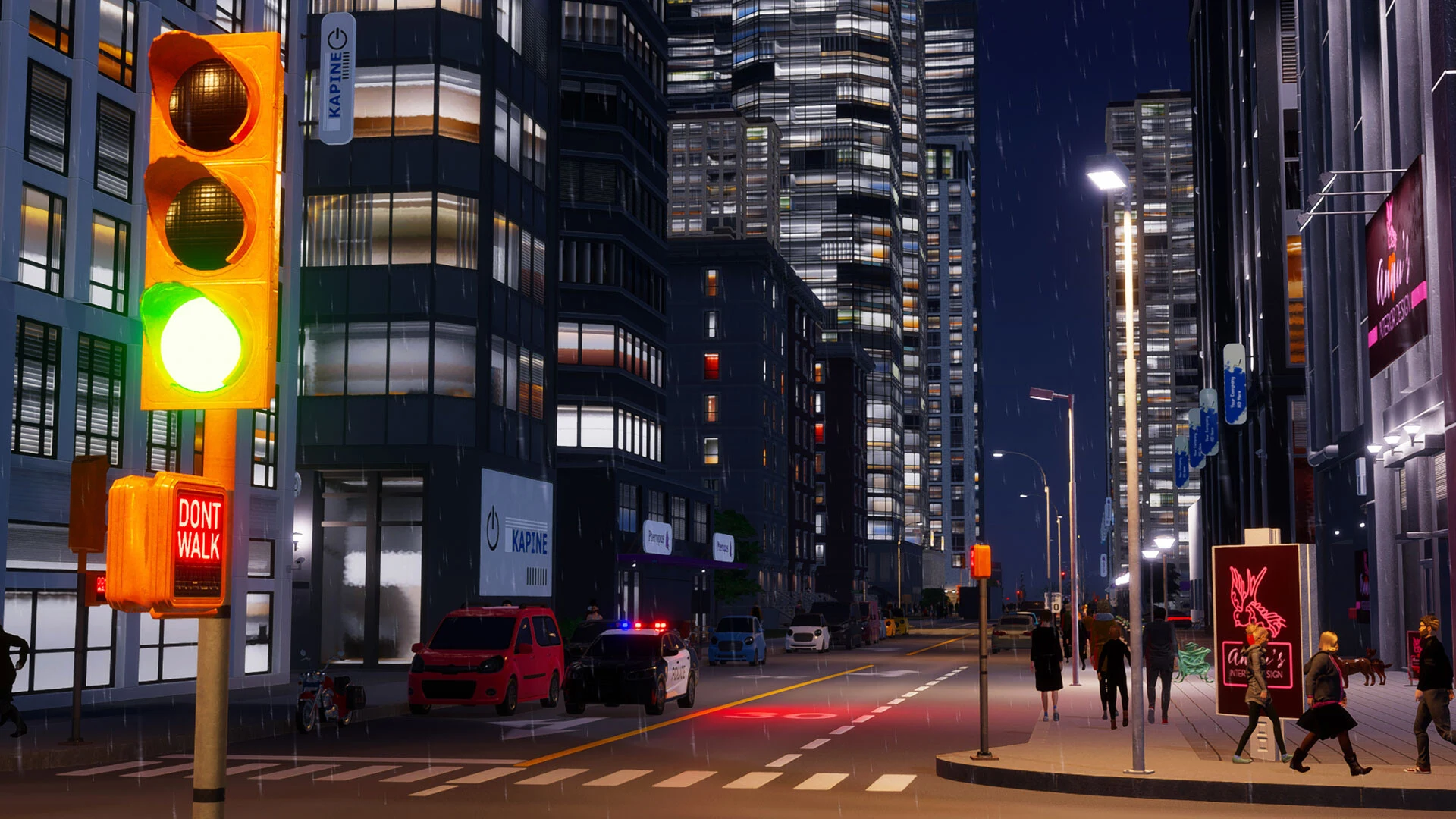 A downtown street at night with lit office towers, a traffic light, a Don't Walk sign and people crossing