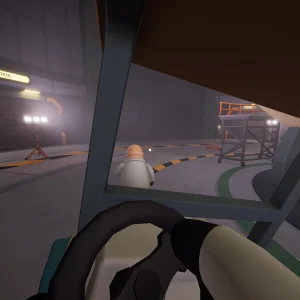 First-person view from the driver's seat of a golf cart rolling across the dim lab floor toward another worker