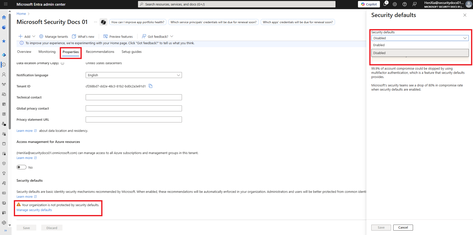 Microsoft Entra admin center Properties tab with the Security defaults panel open and the Enabled or Disabled dropdown