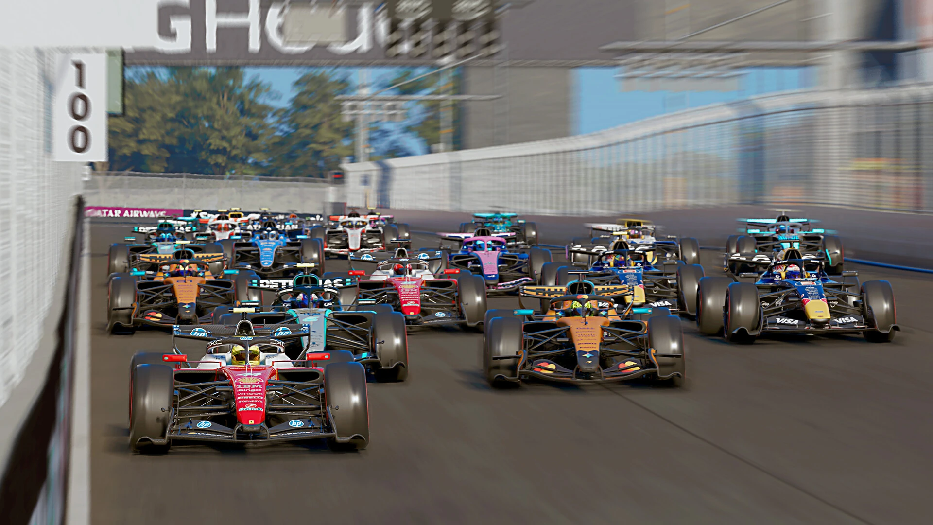 The full 2026 grid of cars bunched together just after a race start in F1 25
