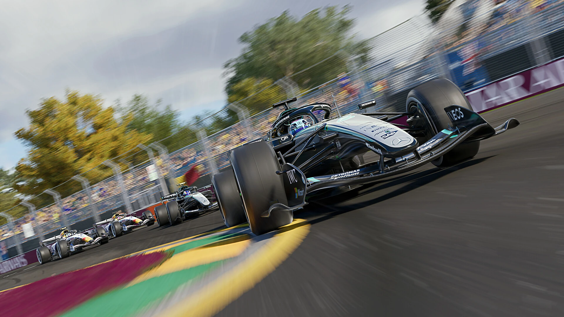 A black 2026 Mercedes runs over a colorful curb ahead of the pack at Albert Park in F1 25