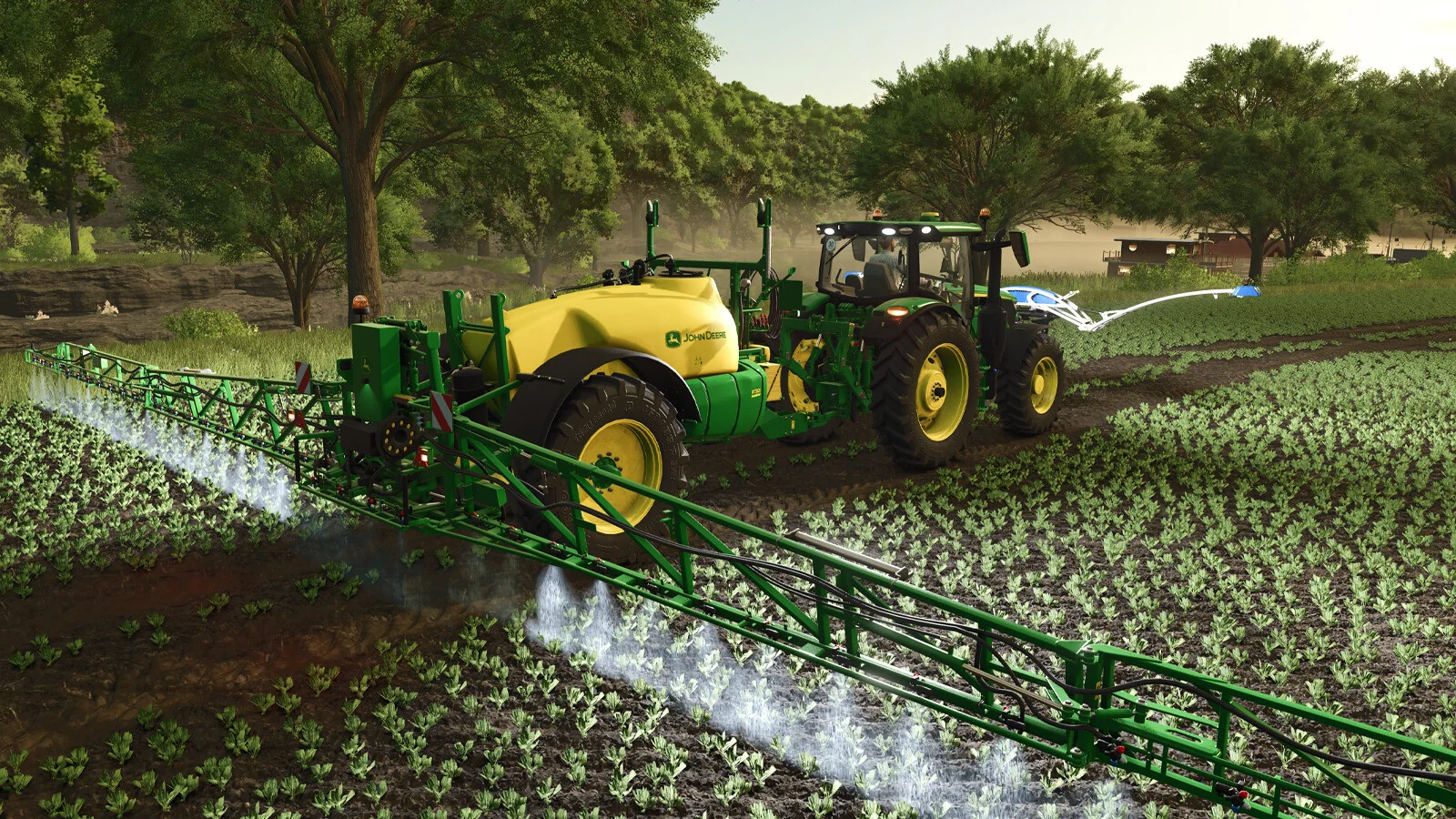 A John Deere tractor with a trailed sprayer spot-sprays a young crop field in the Precision Farming add-on for Farming Simulator 25