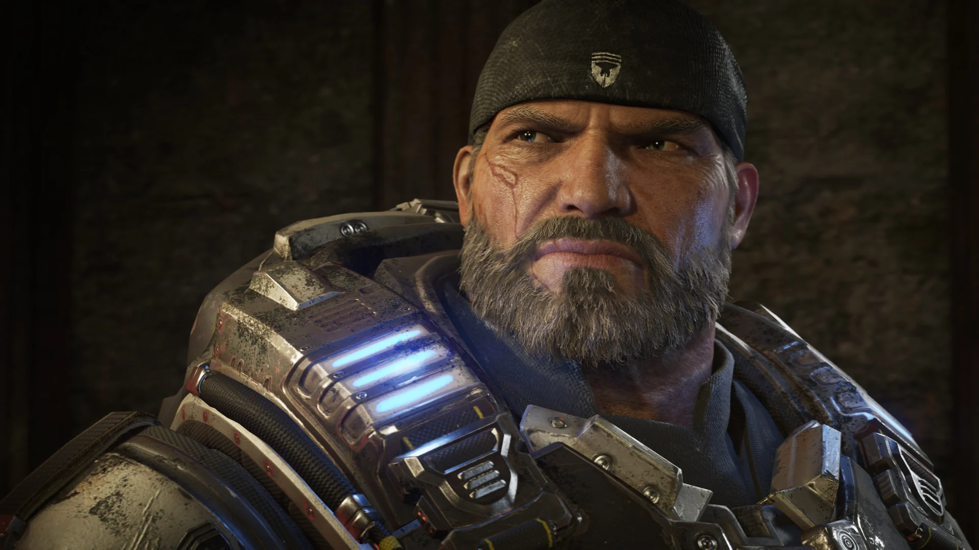An older Marcus Fenix with a gray beard and bandana looks ahead with a stern face