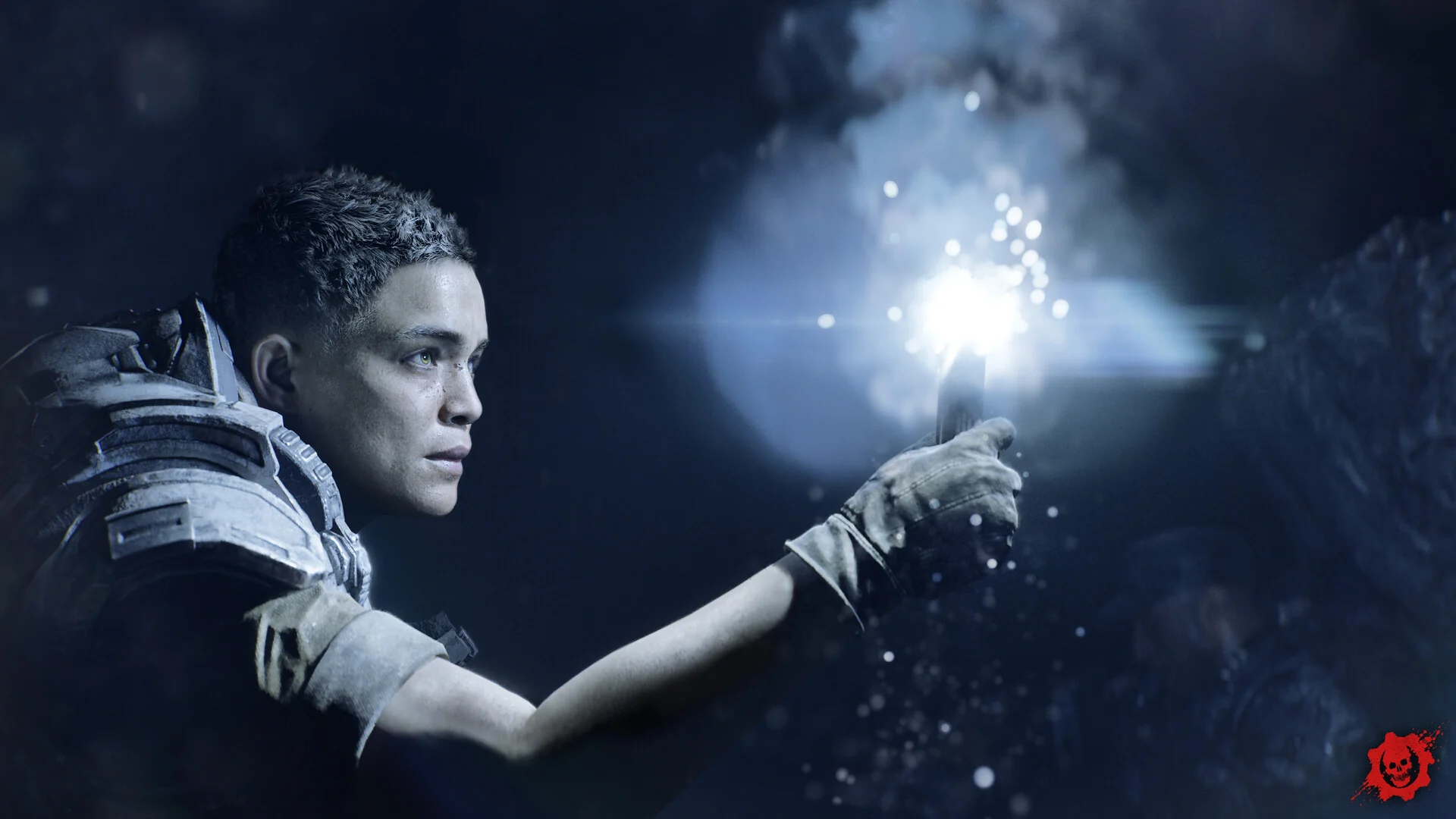 A young soldier holds a bright flare out into a dark underground space