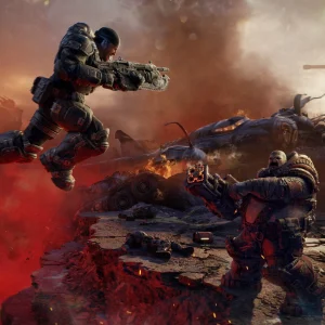 A COG soldier leaps across a gap firing a Lancer while a Locust Boomer aims its launcher on a red-lit battlefield