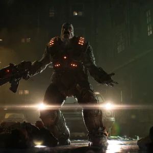 A large armored Locust holding a rifle stands in a dark city street lit by car headlights