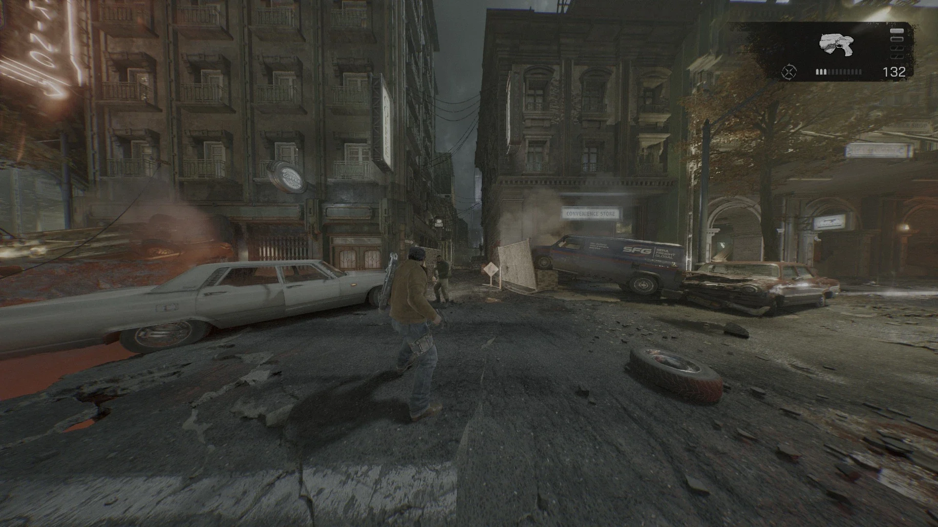 A wide field of view shot of a ruined city street with wrecked cars, taken with the FOV Tweaks mod