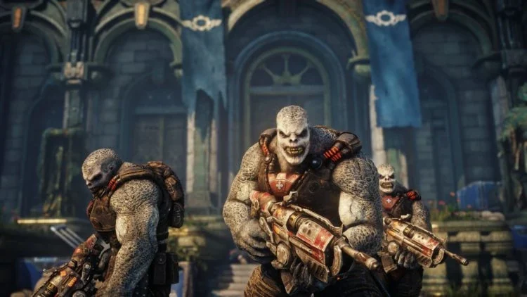 Several Locust Drones holding Hammerburst rifles stand in front of an old stone building
