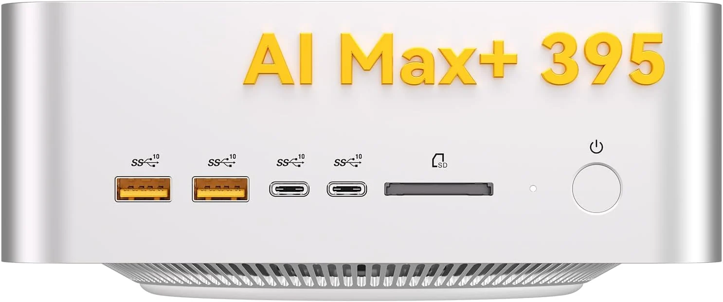 Front of the silver GEEKOM A9 Mega mini PC with two USB-A ports, two USB-C ports, an SD card slot and a power button